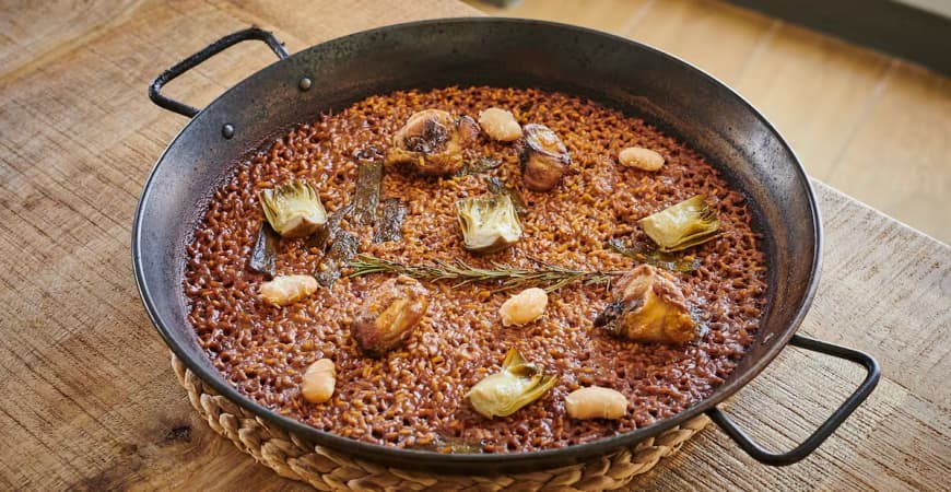 Paella côncava ou paella plana?